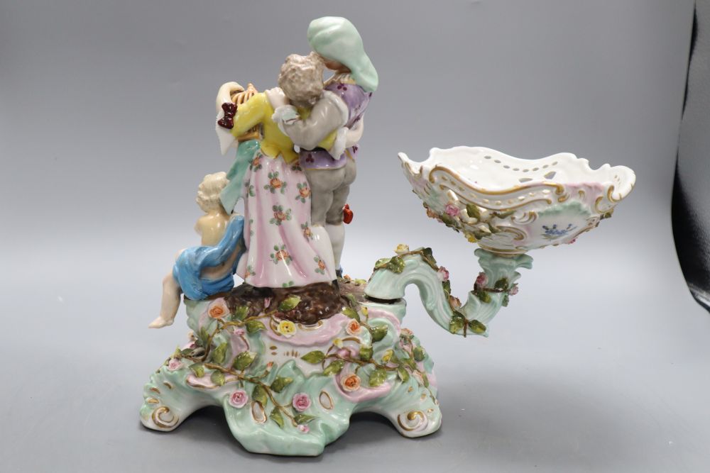 A pair of plaster cherubs and a Sitzendorf porcelain centrepiece